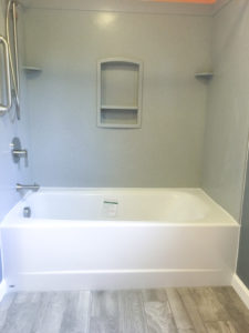 Swanstone tub surround and an Americast tub